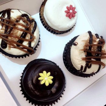 Georgetown Cupcake - Chocolate Ganache cupcake on the bottom. $3.50 per cupcake. - Cupcakes Near Me - Washington, DC, District of Columbia