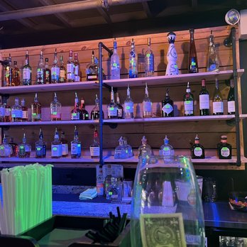 Ready Up Game Lounge - bottles of alcohol on shelves - Arcades Near Me - Burlington, North Carolina Ready Up Game Lounge - bottles of alcohol on shelves - Arcades Near Me - Burlington, North Carolina