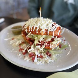 Taqueria Pacheco - I forget the name of this but it's basically a torta with the bread dipped in enchilada sauce. My bf loved it.