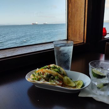 Inferno Lounge - a plate of food and a glass of water - Cocktail Bars Near Me - Astoria, Oregon Inferno Lounge - a plate of food and a glass of water - Cocktail Bars Near Me - Astoria, Oregon