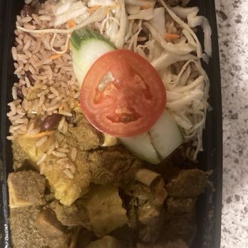 Jumieka Grand - Lunch menu - curry goat and potatoes w/rice n peace. Good flavors combined with the coleslaw salad. - Seafood Near Me - New York, New York