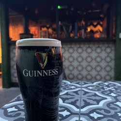 The Hop House - Nicely poured pint in the beer garden with new friends!
