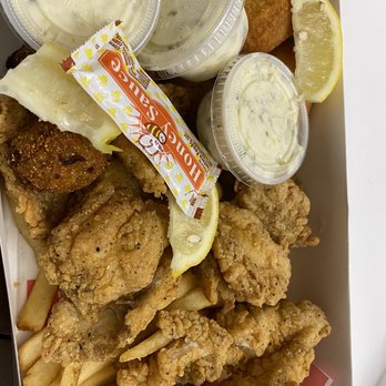 River Smith's Chicken & Catfish - a box of fried fish and fries - Seafood Near Me - Lubbock, Texas