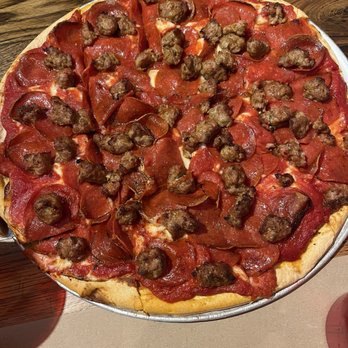 Fixture Pizza Pub - Sausage and pepperoni pizza - Pizza Near Me - Milwaukee, Wisconsin