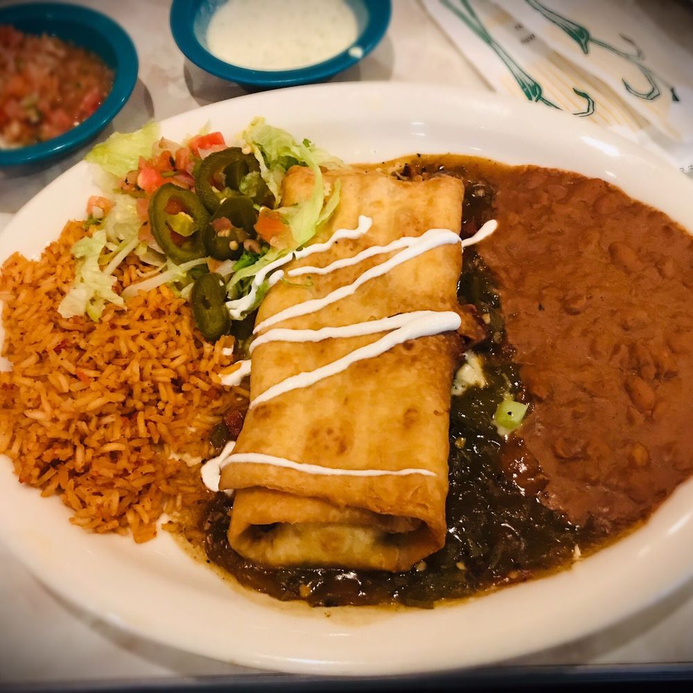 Chuy's - Chicken chimichanga beans and rice on hatch's green chili roasted. Yummy, Yummy, Yummy. - Tex-Mex Near Me - Westminster, Colorado Chuy's - Chicken chimichanga beans and rice on hatch's green chili roasted. Yummy, Yummy, Yummy. - Tex-Mex Near Me - Westminster, Colorado