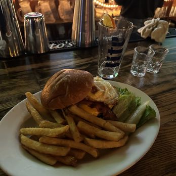 Bradford's Grill & Tavern - HANGOVER BURGER - Angus Beef burger with lettuce, onion & bacon, topped with a hard fried egg, served on a pan toasted brioche roll - Sports Bars Near Me - Stamford, Connecticut Bradford's Grill & Tavern - HANGOVER BURGER - Angus Beef burger with lettuce, onion & bacon, topped with a hard fried egg, served on a pan toasted brioche roll - Sports Bars Near Me - Stamford, Connecticut