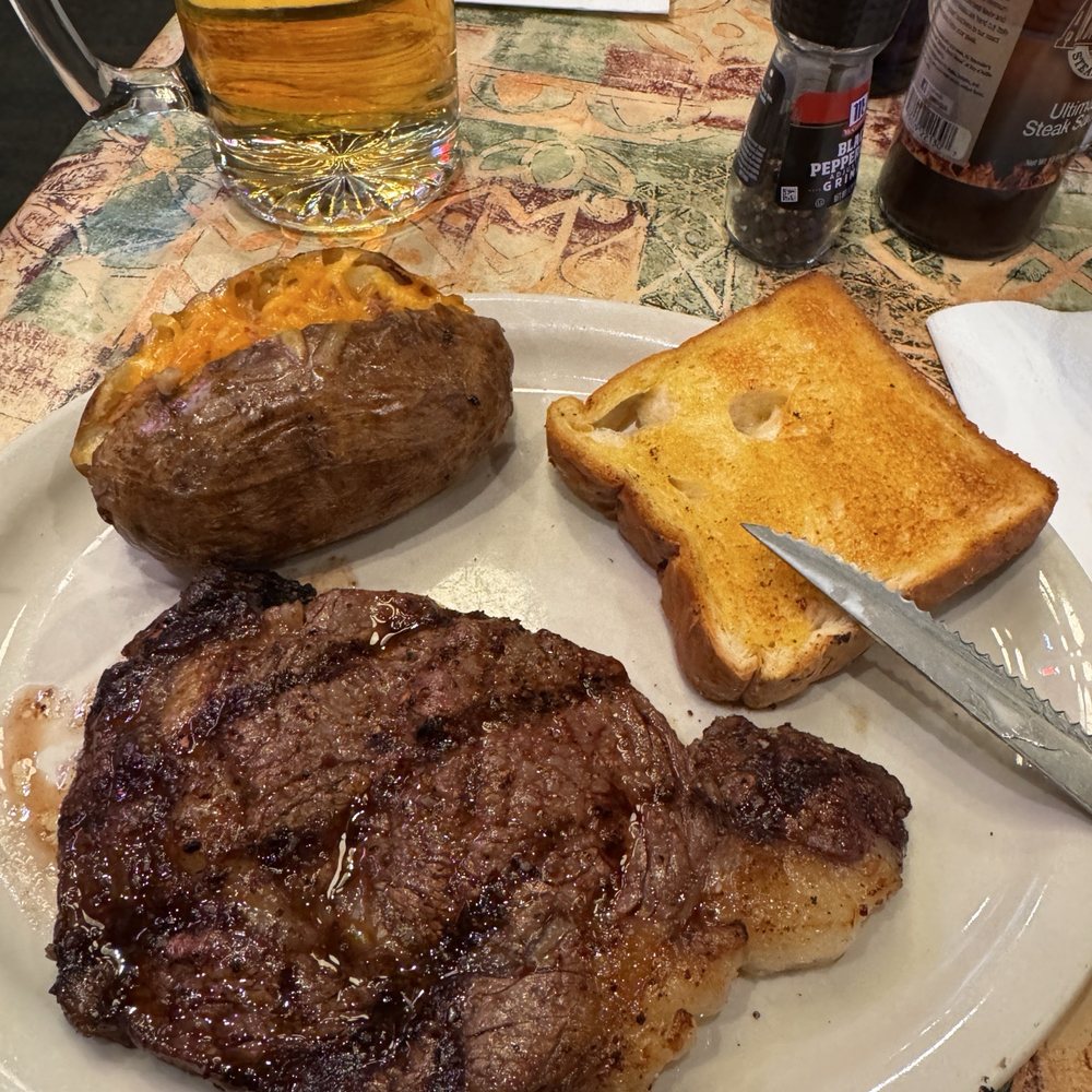 Alexander's Steakhouse - 12oz ribeye - Steakhouses Near Me - Peoria, Illinois