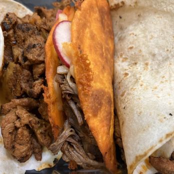 Sofia's Taqueria - Amboy - Il Padrino pork taco; short rib taco Doritos like coating on the tortilla - Cocktail Bars Near Me - Staten Island, New York Sofia's Taqueria - Amboy - Il Padrino pork taco; short rib taco Doritos like coating on the tortilla - Cocktail Bars Near Me - Staten Island, New York