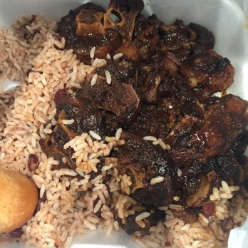 Island Vibez - Oxtail plate from Caribbean sushine bakery- glistening oxtails, balanced flavors, rice and beans were delicious - Caribbean Near Me - Orlando, Florida