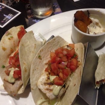 Hard Rock Cafe - Fish Tacos with Plantains in yogurt. The side was delicious, the tacos had no flavor. - Burgers Near Me - Honolulu, Hawaii Hard Rock Cafe - Fish Tacos with Plantains in yogurt. The side was delicious, the tacos had no flavor. - Burgers Near Me - Honolulu, Hawaii