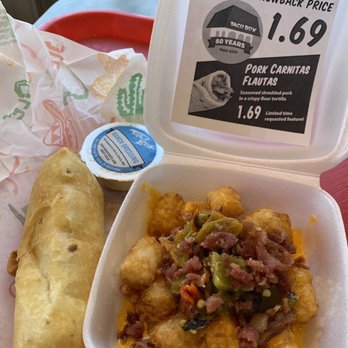 Taco Box - Clovis - Chicken chimi (cream cheese, chicken, red/green chile, deep fried) and cheddar fries with added bacon (70¢) and added green chile (50¢) - Mexican Near Me - Clovis, New Mexico