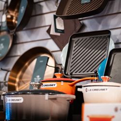 The Kitchen Shop - Cast iron from Smithey in Charleston, SC and Le Creuset produced in France.