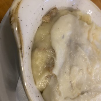 Olivia's Cafe - Side of mashed potatoes and white gravy - New American Near Me - Lake Buena Vista, Florida Olivia's Cafe - Side of mashed potatoes and white gravy - New American Near Me - Lake Buena Vista, Florida