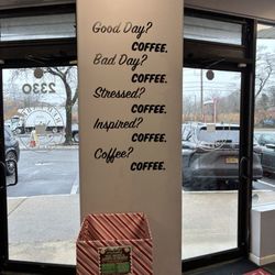 Red Label Coffee - Donation box for Christmas. Cute coffee messages on wall. It's always the right time for coffee lol .