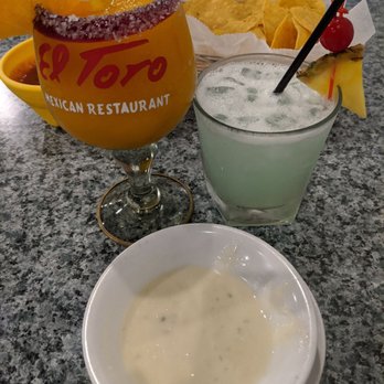 El Toro Bravo - Small cheese dip and chips, mango margarita, and passion fruit margarita - Mexican Near Me - Indianapolis, Indiana El Toro Bravo - Small cheese dip and chips, mango margarita, and passion fruit margarita - Mexican Near Me - Indianapolis, Indiana