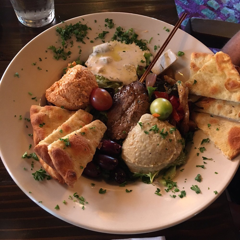 Grass Rootes - Mediterranean platter with hummus, olives, and a lamb kabob. - New American Near Me - Culpeper, Virginia Grass Rootes - Mediterranean platter with hummus, olives, and a lamb kabob. - New American Near Me - Culpeper, Virginia