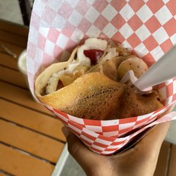 Hana Banana Crepes - Crepe with whipped cream, 2 toppings (fruits being strawberries and bananas), with a coat of Nutella
