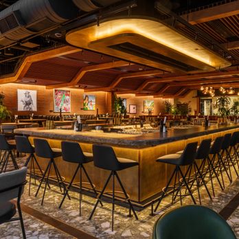 JOEY Maple - The 21+ lounge at JOEY Maple's bar in Uptown Dallas, featuring contemporary seating, curated artwork and warm wood detailing. - Steakhouses Near Me - Dallas, Texas JOEY Maple - The 21+ lounge at JOEY Maple's bar in Uptown Dallas, featuring contemporary seating, curated artwork and warm wood detailing. - Steakhouses Near Me - Dallas, Texas