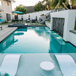 Pool and backyard. Pool and backyard.