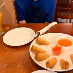 Thai spring rolls and mango juice.