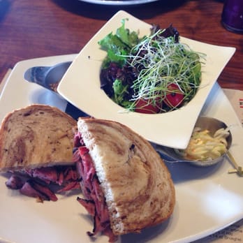 Amsterdam BrewHouse - Montreal smoke meat sandwich with a simple salad and coleslaw. - Breweries Near Me - Toronto, Ontario