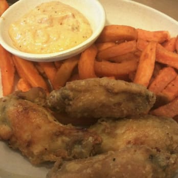 Karai Crab - Chicken wings and sweet potato fries - Seafood Near Me - Honolulu, Hawaii