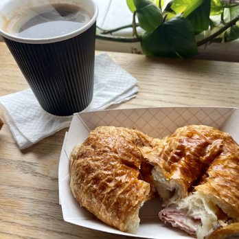 Mountaineer Coffee - ham and cheese croissant and hot americano - Coffee Roasteries Near Me - Brooksville, Florida
