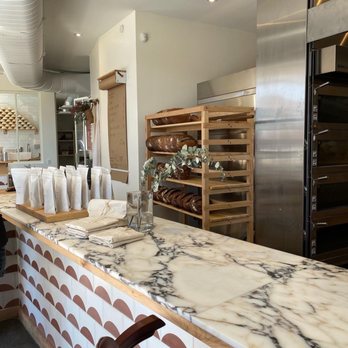 Miette - a kitchen with a marble counter top - Bakeries Near Me - Montreal, Quebec