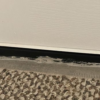 Century Communities - a close up of a door and a carpet - General Contractors Near Me - Austin, Texas