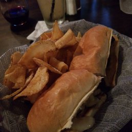 Steak Sandwich with cheese and mushrooms w/ parmesan chips Steak Sandwich with cheese and mushrooms w/ parmesan chips