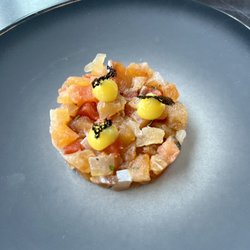 The Sensory Restaurant & Wit Bar - Amuse Buche of gravade lachs and char with a lemon drop and squid ink tuile.