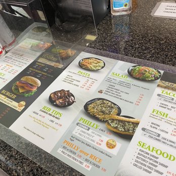 A Town Wings - a menu on a counter - American Near Me - Lithonia, Georgia A Town Wings - a menu on a counter - American Near Me - Lithonia, Georgia