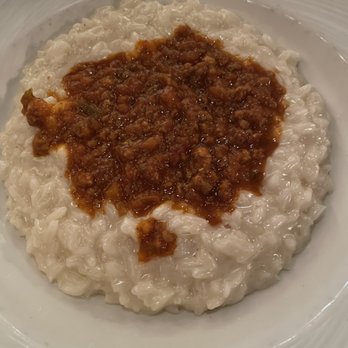 Piccolo Sogno - Risotto special cooked in chicken broth & topped w/meat ragu. - Italian Near Me - Chicago, Illinois Piccolo Sogno - Risotto special cooked in chicken broth & topped w/meat ragu. - Italian Near Me - Chicago, Illinois