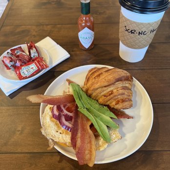 Toasted - Croissant bacon over easy egg avocado onion - Coffee & Tea Near Me - Riverside, California