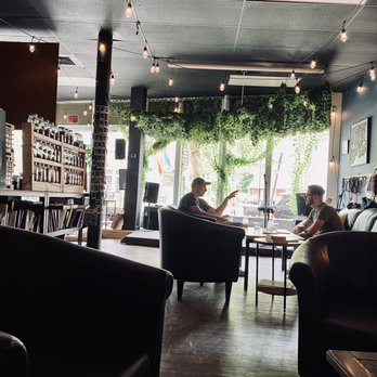 Gather - two people sitting at a table in a restaurant - Coffee & Tea Near Me - New Haven, Connecticut