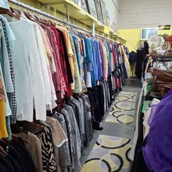 Re-Love It a Consignment Shoppe - Racks & Racks of awesome clothes!