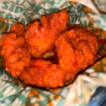 Wingstop - a close up view of a basket of food - Chicken Wings Near Me - North Hollywood, California