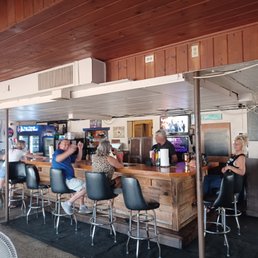 people sitting at the bar people sitting at the bar