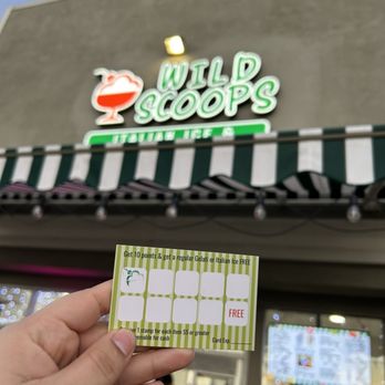 Wild Scoops - a hand holding a ticket - Ice Cream & Frozen Yogurt Near Me - Norwalk, California Wild Scoops - a hand holding a ticket - Ice Cream & Frozen Yogurt Near Me - Norwalk, California