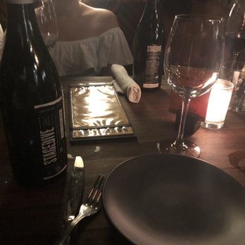 Postino Heights - Bottles of wine on our table! - Wine Bars Near Me - Houston, Texas Postino Heights - Bottles of wine on our table! - Wine Bars Near Me - Houston, Texas