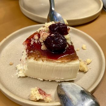 Cosetta - Basque-style cheesecake with sour cherry compote - Italian Near Me - Santa Monica, California Cosetta - Basque-style cheesecake with sour cherry compote - Italian Near Me - Santa Monica, California