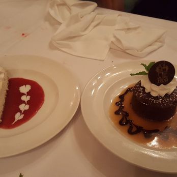 Hy's Steak House - Cheesecake with strawberry sauce and molten chocolate cake with caramel sauce. Between the two, I would recommend the chocolate. - Steakhouses Near Me - Honolulu, Hawaii Hy's Steak House - Cheesecake with strawberry sauce and molten chocolate cake with caramel sauce. Between the two, I would recommend the chocolate. - Steakhouses Near Me - Honolulu, Hawaii