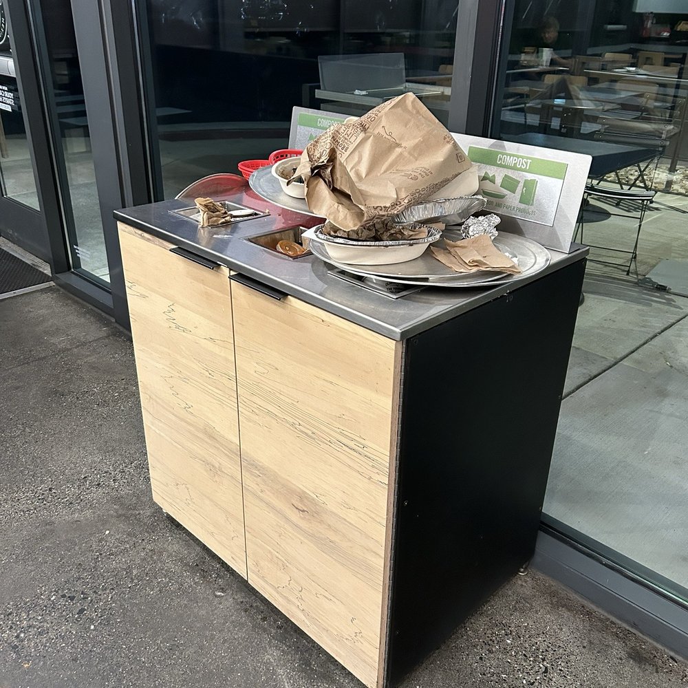 Trash too full to even throw more away.