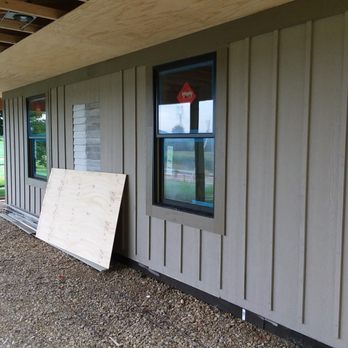 C & L Remodeling and Construction - a garage with a door and window - General Contractors Near Me - Newark, Ohio C & L Remodeling and Construction - a garage with a door and window - General Contractors Near Me - Newark, Ohio