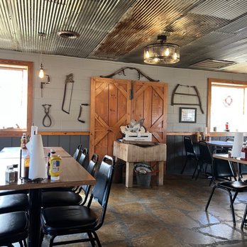 Amazin Blaze BBQ - tables and chairs in a restaurant - Barbeque Near Me - Hardin, Kentucky