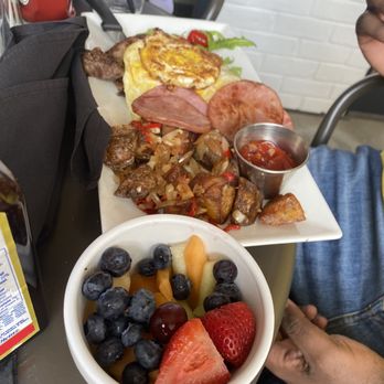 Easy Like Sunday - Steak and eggs with a side of fruit and Canadian bacon - Breakfast & Brunch Near Me - Baltimore, Maryland Easy Like Sunday - Steak and eggs with a side of fruit and Canadian bacon - Breakfast & Brunch Near Me - Baltimore, Maryland