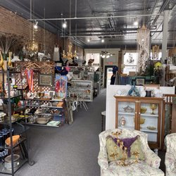 Amazing Grace Antiques - Left side of store and historic building.
