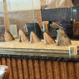 Some fish heads greeting guests