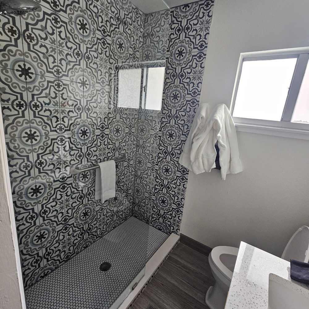 Casa Limonada - Bathroom in the Sea Pink Studio - Hotels Near Me - Sarasota, Florida Casa Limonada - Bathroom in the Sea Pink Studio - Hotels Near Me - Sarasota, Florida