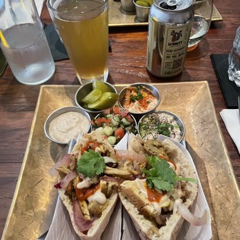 Hummus Kitchen - Shawarma Pita Tacos and a happy hour Schnitt Tel Aviv beer - Middle Eastern Near Me - New York, New York